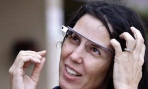 Cecilia Abadie wears her Google Glass as she talks with her attorney outside of traffic court Tuesday, Dec. 3, 2013, in San Diego. When Abadie was pulled over on suspicion of speeding in October, the officer saw she was wearing Google Glass and tacked on a citation usually given to drivers who may be distracted by a video or TV screen. She pleaded not guilty to both charges on Tuesday. (AP Photo/Lenny Ignelzi) Photograph: Lenny Ignelzi/AP