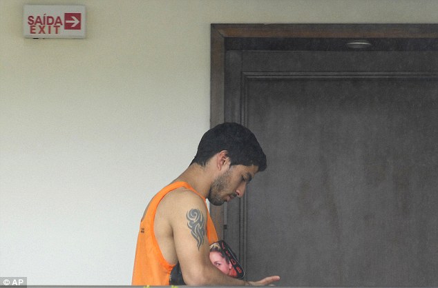 Bye bye Suarez: The first photos have emerged of the Uruguay striker in Natal, Brazil, since he received his ban.